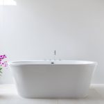 luxury-bathroom-features-bathtub-with-flower-1.jpg
